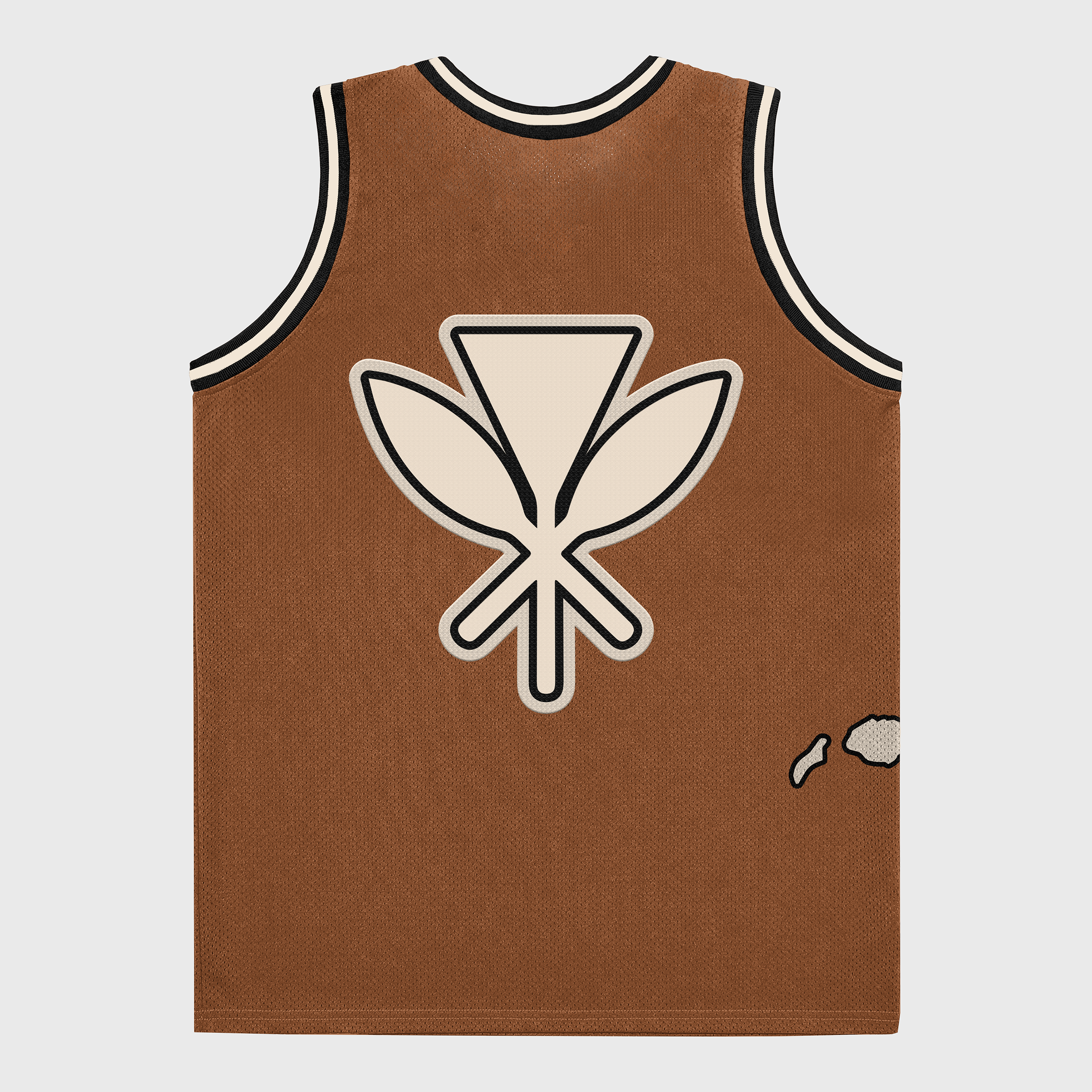 A brown basketball jersey with a Kahili symbol embraided on the back, along with tribal patterns and a Hawaiian island chain at the bottom right. 